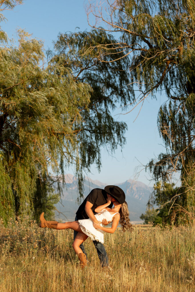 Rilee and Colby kiss during their Charlo Montana engagement session