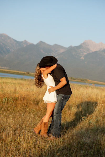 Rilee and Colby sharing an intimate kiss during their Montana engagement session in Charlo
