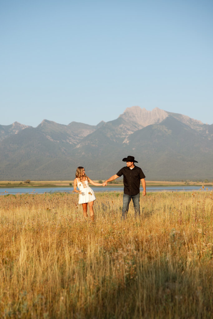 a wide shot of a couple in the mission valley
