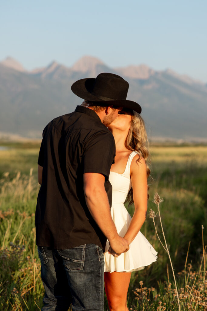 couple kissing during a mission valley engagement session