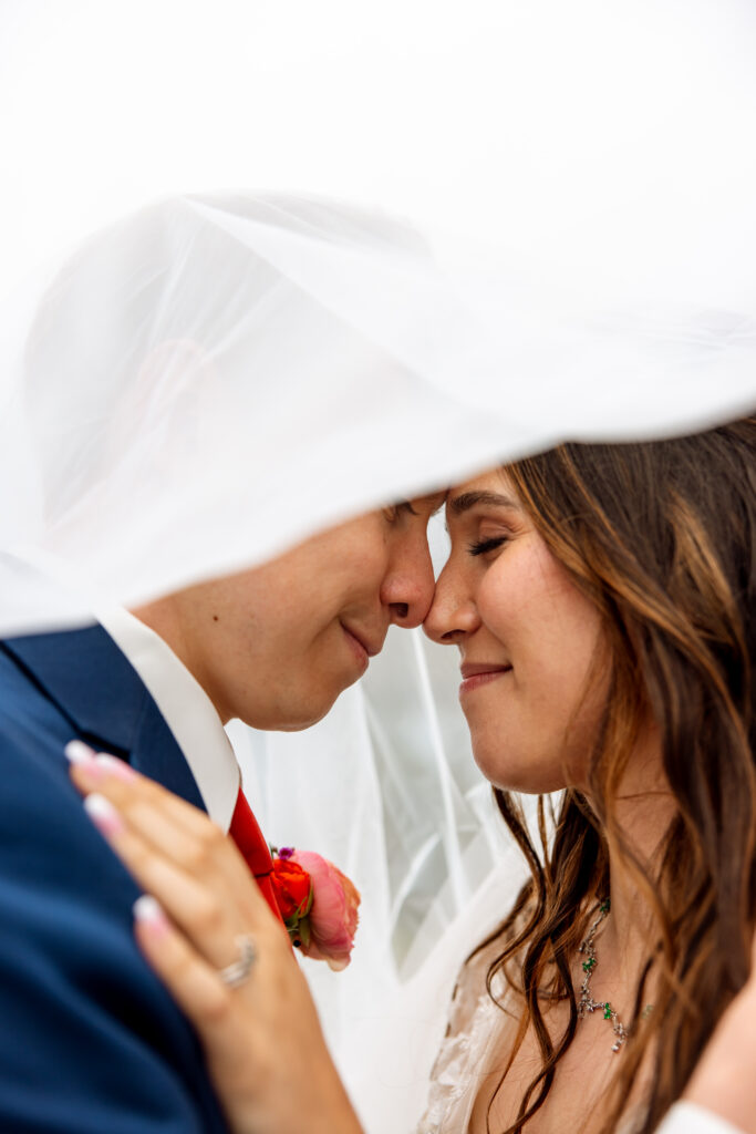 close up photo of sweet moment between bride and groom