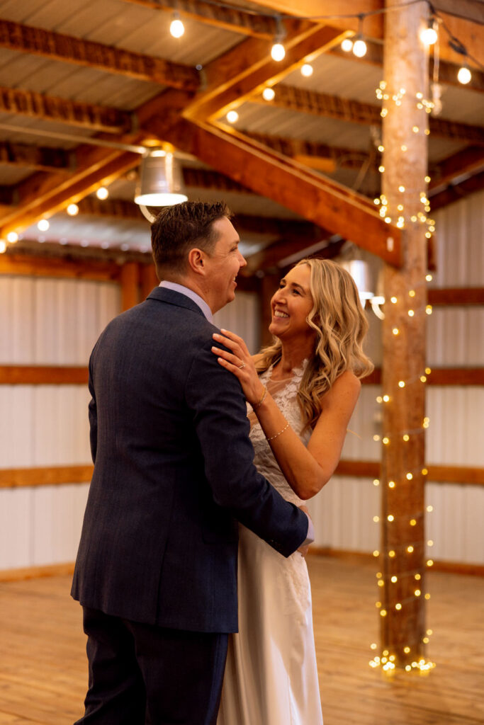 Bride smiling at groom after first look kiss at Diamond B Weddings — Kalispell Montana wedding photographer — Stacy Edwards Photography