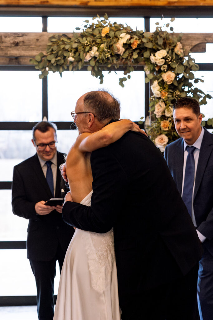 Bride hugging father at the altar at Diamond B Weddings — Kalispell Montana wedding photographer — Stacy Edwards Photography