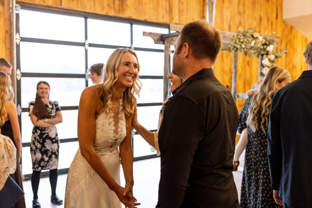 Candid front facing portrait of bride smiling during wedding day — Scott and Molly — Diamond B Weddings Kalispell Montana — Stacy Edwards Photography