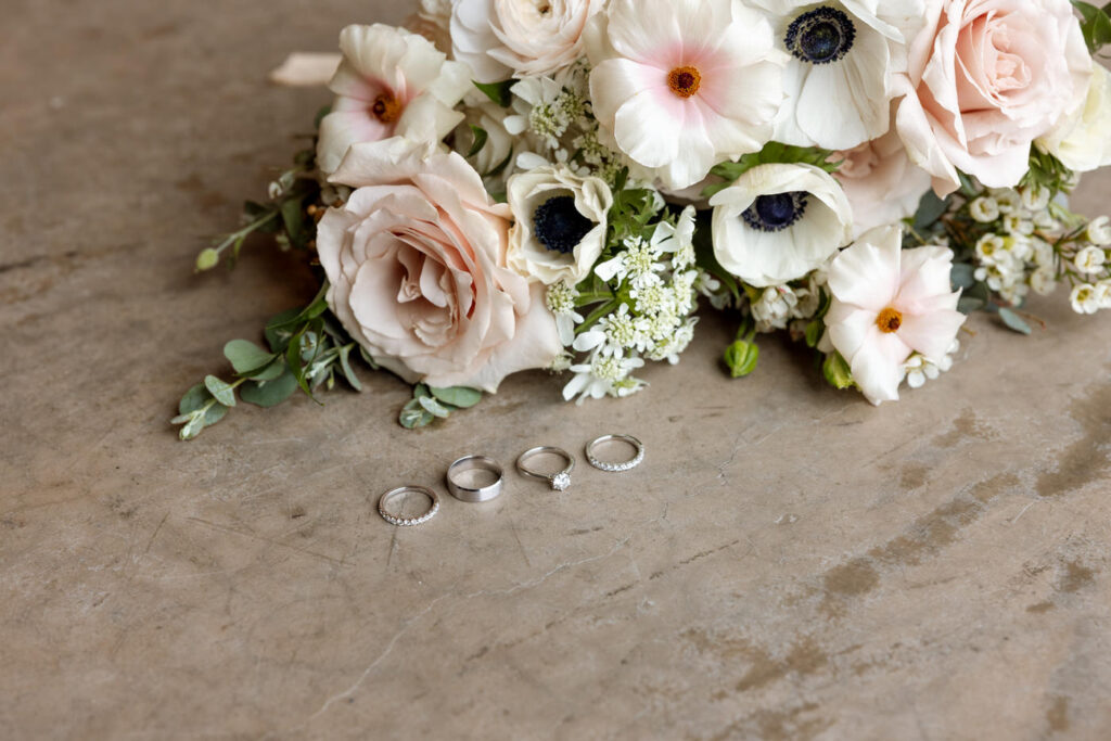 Wedding rings and bridal bouquet detail — Scott and Molly — Diamond B Weddings Kalispell Montana — Stacy Edwards Photography