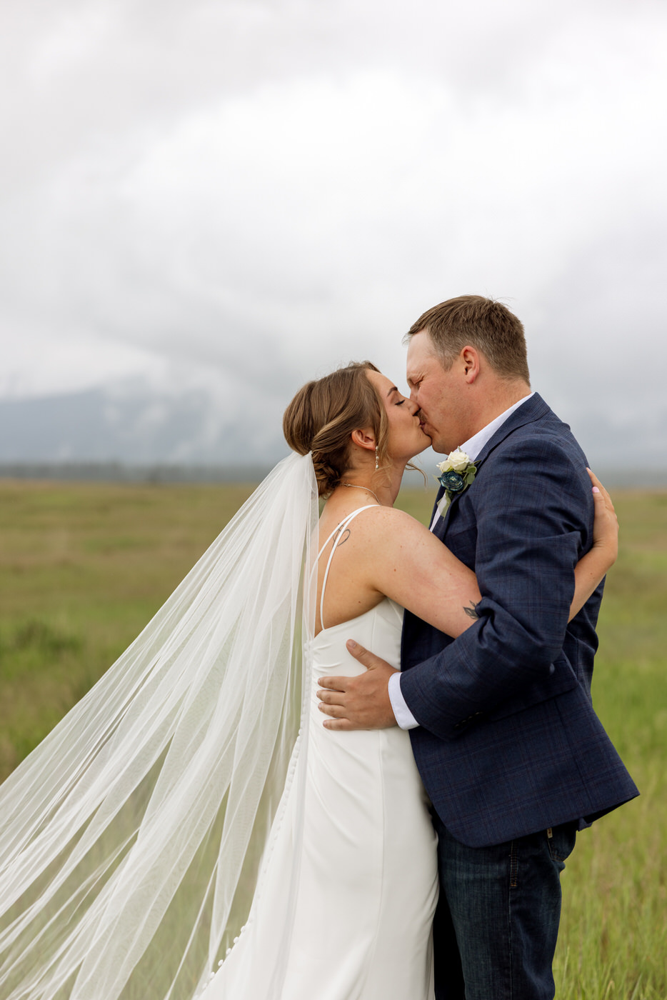 Close up photo of Bride and Groom kissing — Aislynn + Kyle — Mission Valley Wedding — Charlo Montana — Stacy Edwards Photography