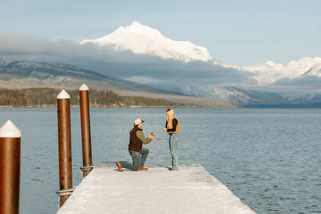 Winter surprise proposal on the Apgar Village dock overlooking Lake McDonald — Lindsey and Ethan — Glacier National Park Proposal Photographer — Stacy Edwards Photography